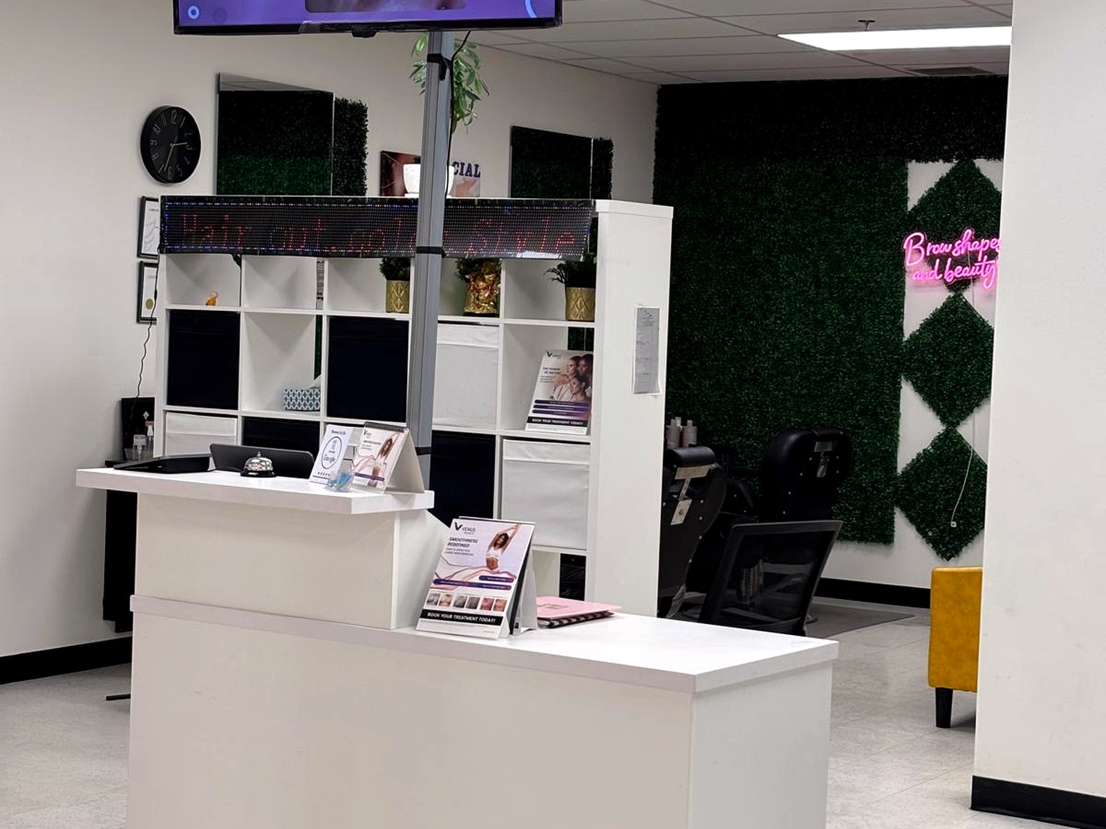 Our salon reception and brow chairs inside McPhillips Superstore